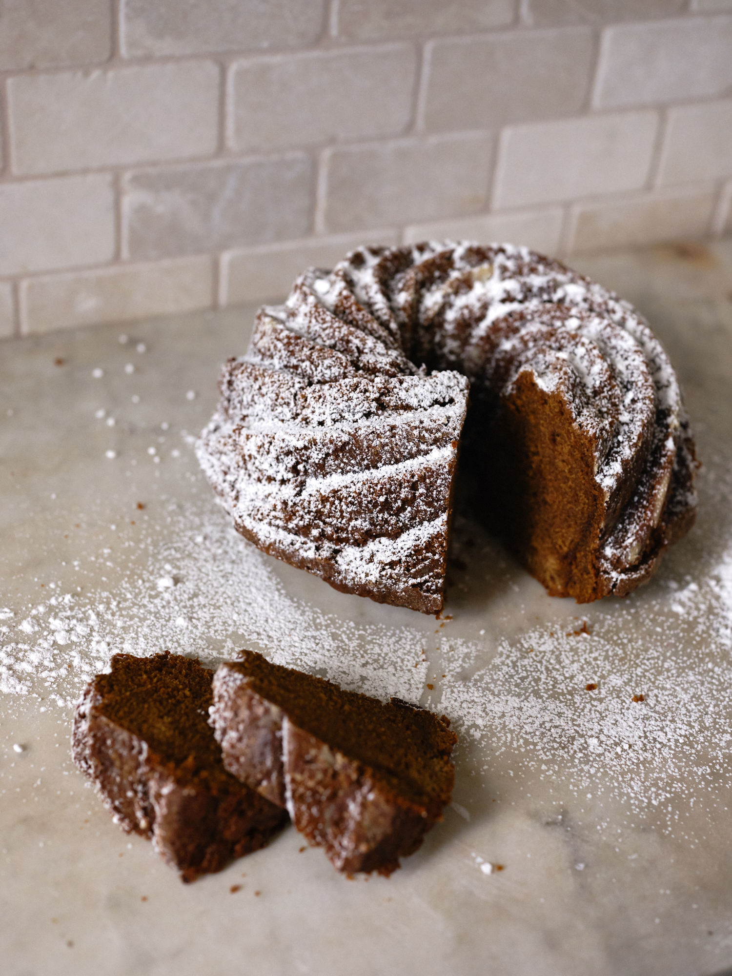 Black Sticky Gingerbread Dusted with Powdered Sugar
