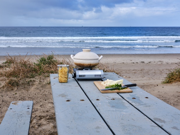 Ingredients for Spicy Coconut Curry Noodles on Picnic table