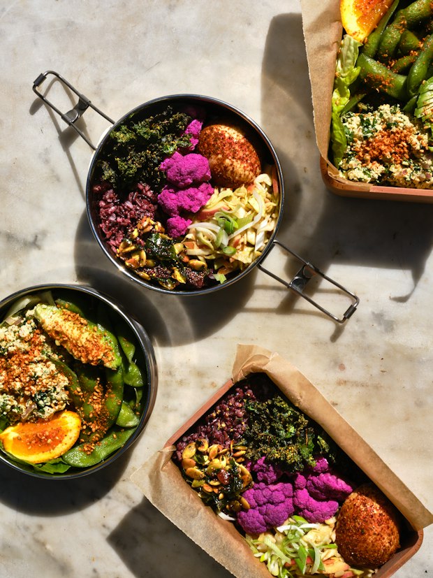 Pickled Cauliflower in a bowl along with other lunch food