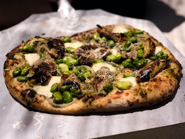 Close-up photo of Pizza with Artichokes and Fava Beans