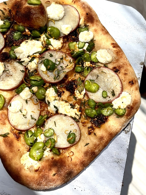 Pizza with potatoes, fava beans, ricotta, herbs and lemon