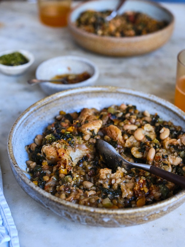 Ribollita, a beautifully thick Tuscan stew with dark greens, lots of beans, vegetables, olive oil, and thickened with day-old bread