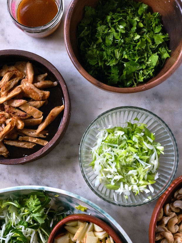 ingredients for shredded un-chicken salad arranged on a countertop