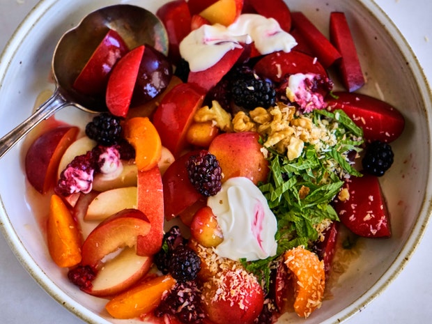 summer fruit salad in a ceramic bowl